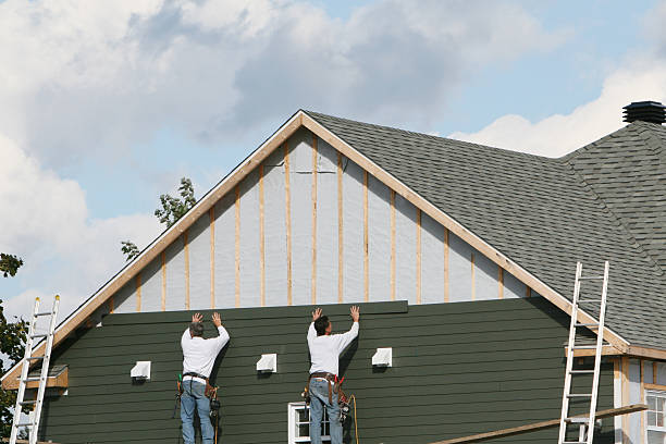 Professional Siding Installation technician working in Brightwood, VA